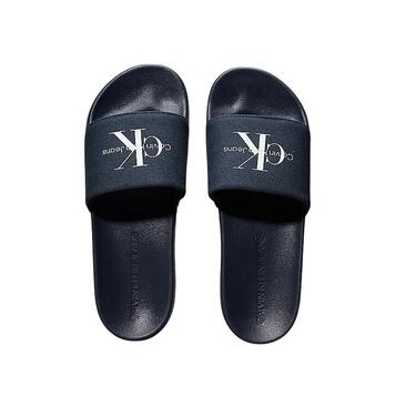 Aνδρικές Παντόφλες Calvin Klein Slide Monogram Triple Calvin Navy YM0YM01271-DW4 Aνδρικές Παντόφλες Calvin Klein Slide Monogram Triple Calvin Navy YM0YM01271-DW4